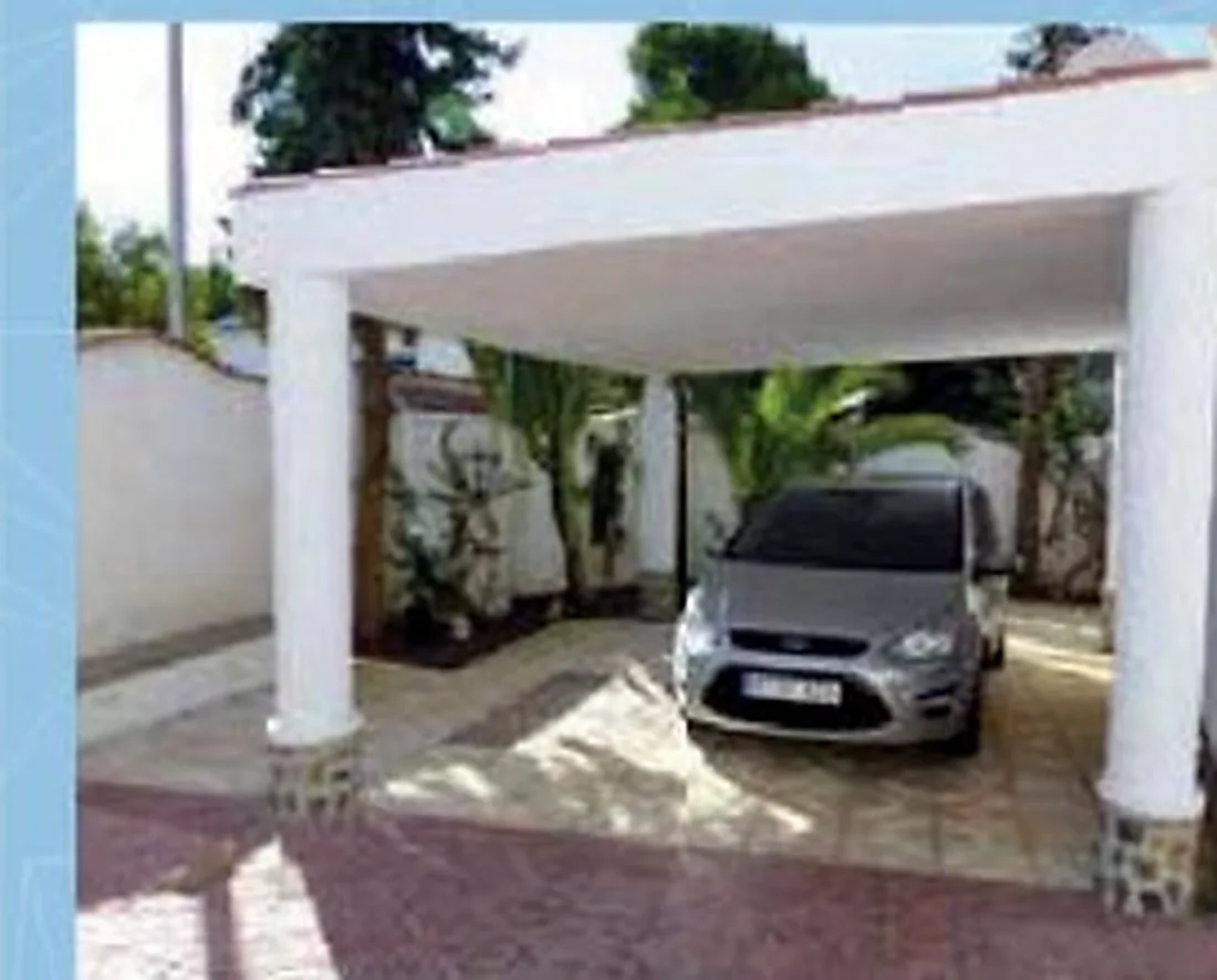Villa vehicle beneath covered parking
