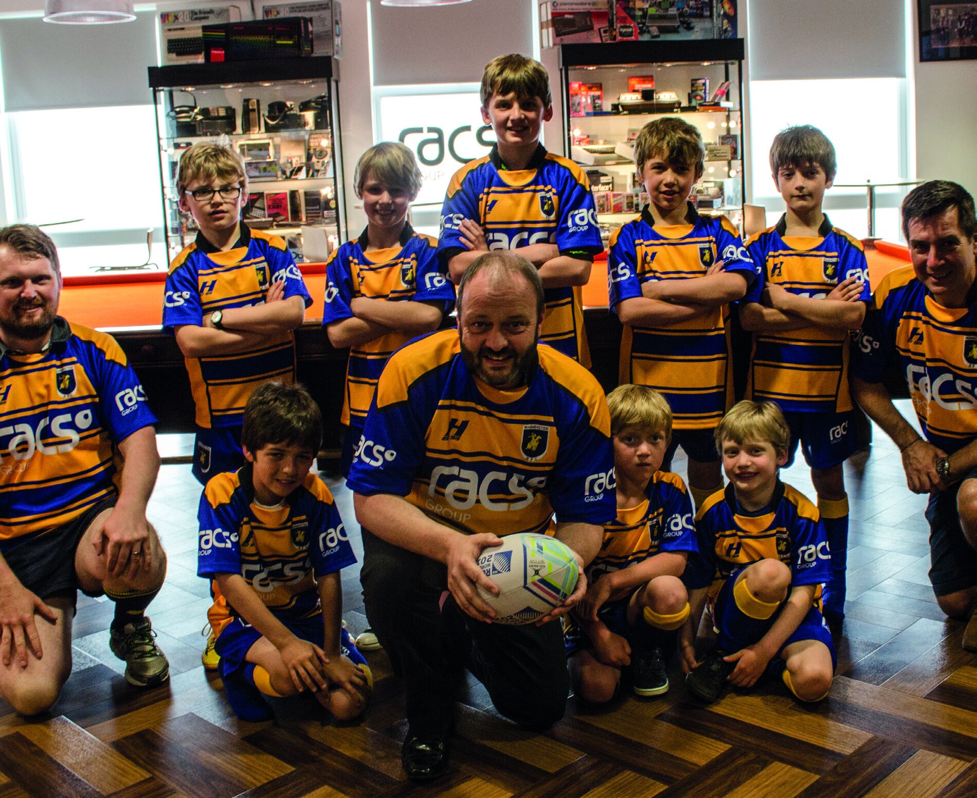 RACS-supported youth rugby group with Terence Hillier